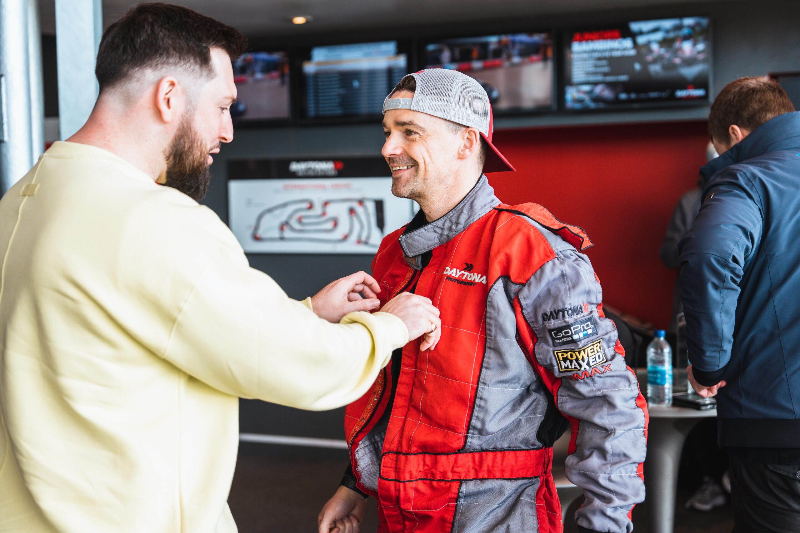 Two colleagues getting ready for their Karting Work Christmas Party at Daytona