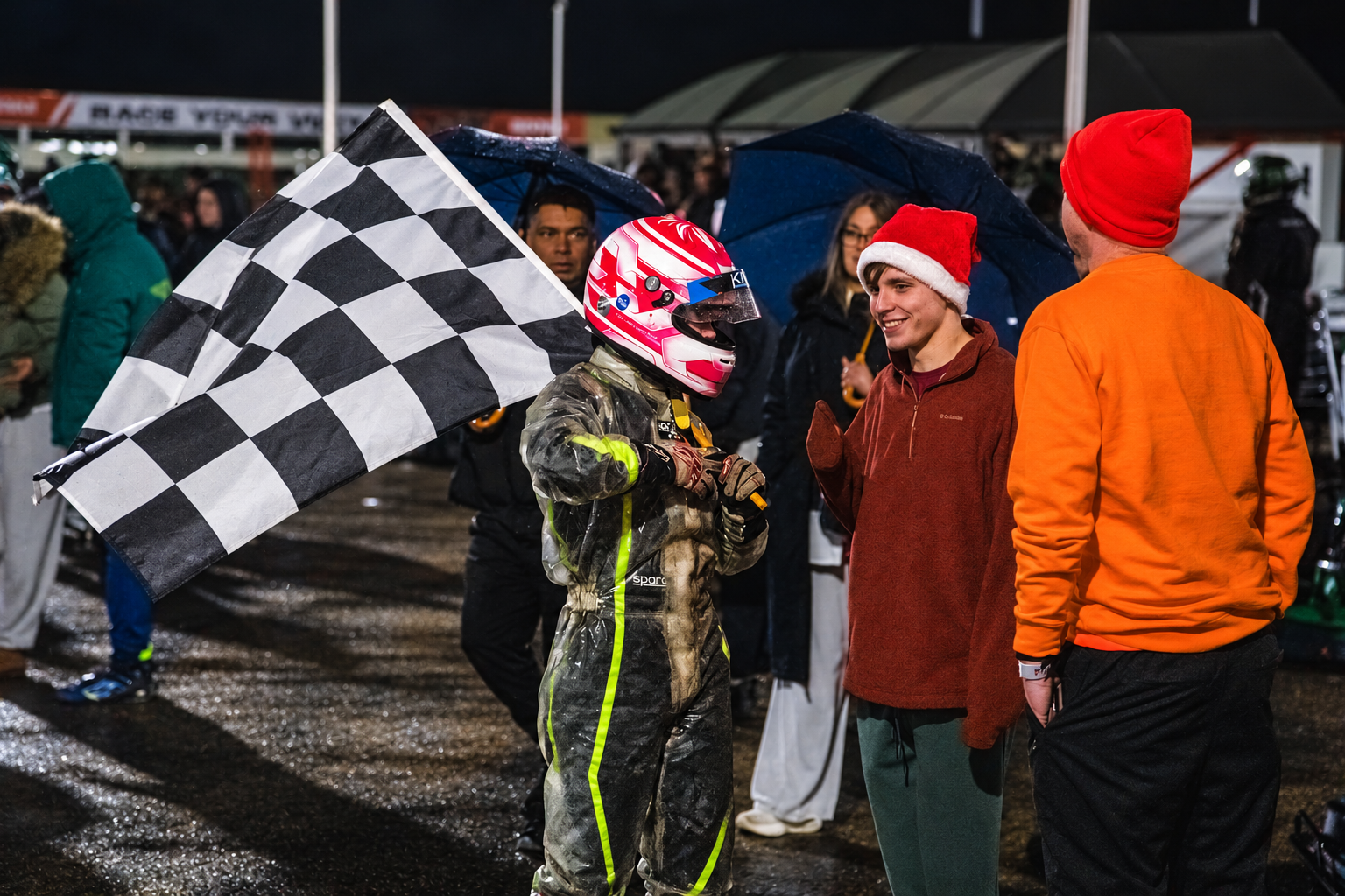 Nighttime driver with a checkered flag 1
